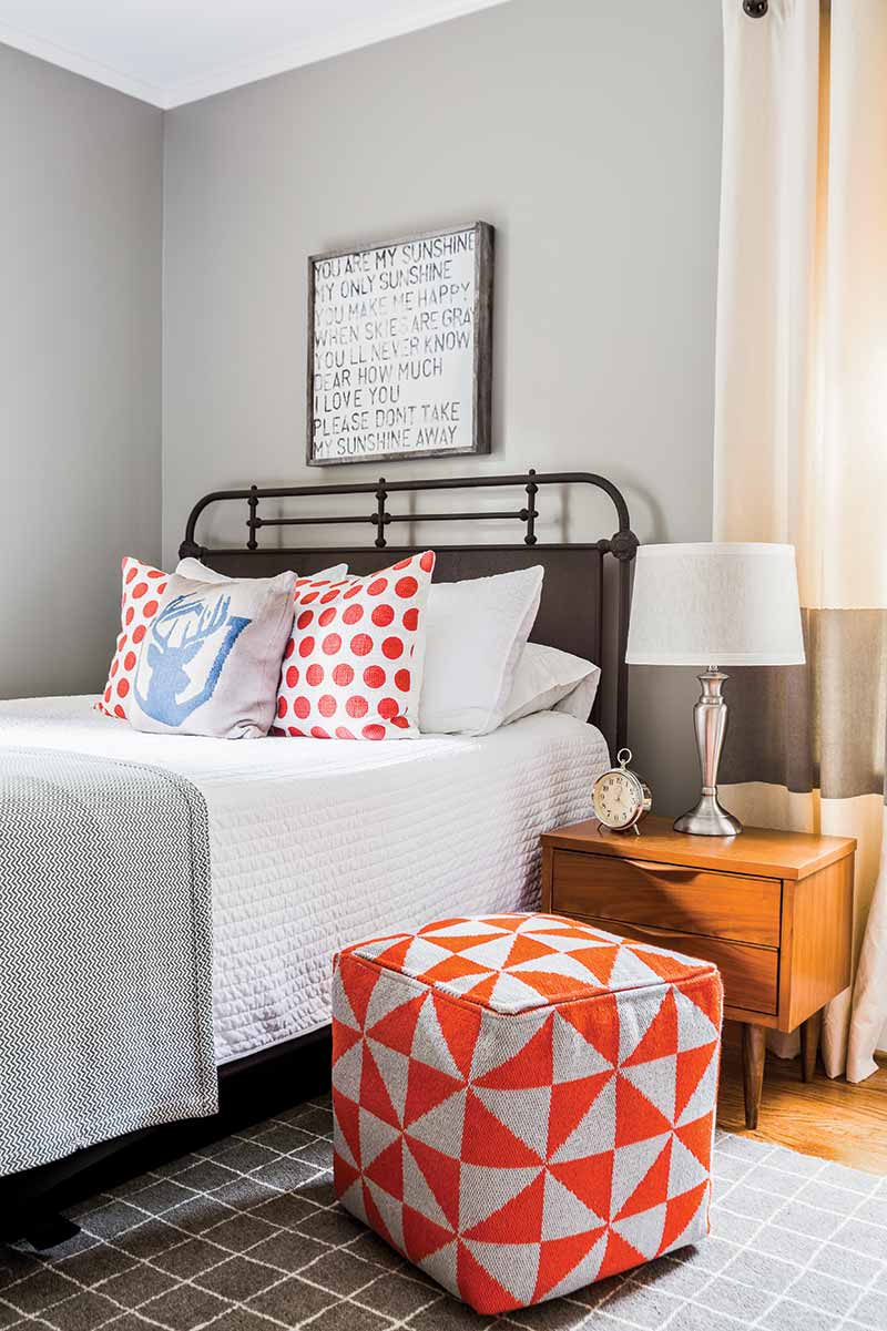 Young boy's room with gray walls and colorful accents