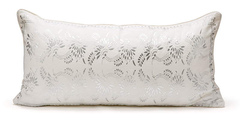 white and silver metallic lumbar pillow