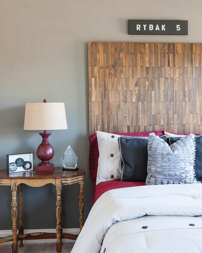 stained stir stick headboard