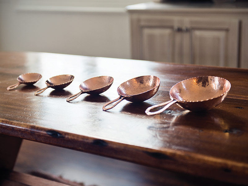 hand-made copper measuring cups