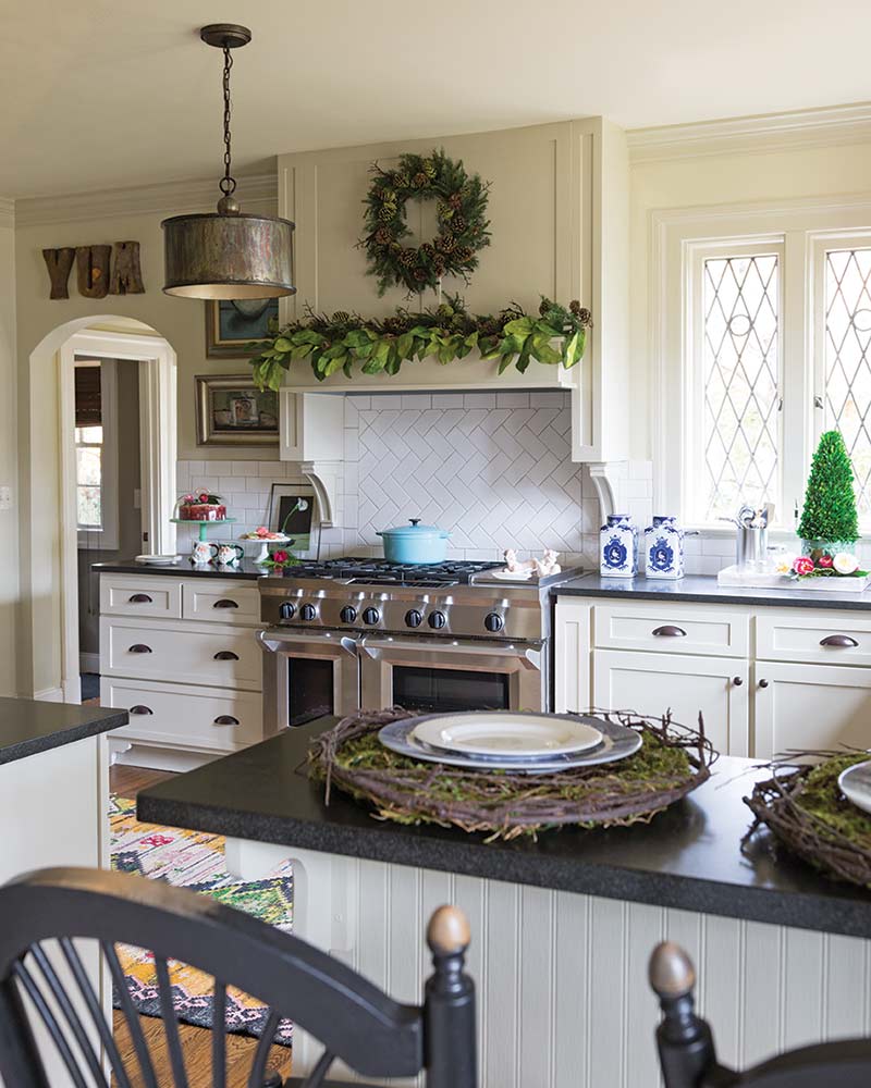 Christmas greenery in white kitchen 