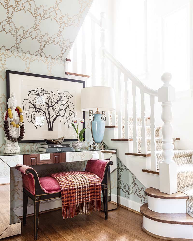 staircase and vibrant velvet bench