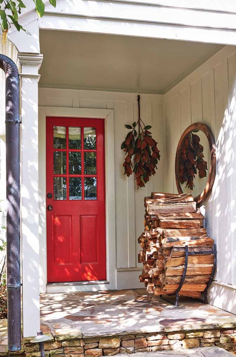 red front door and firewood