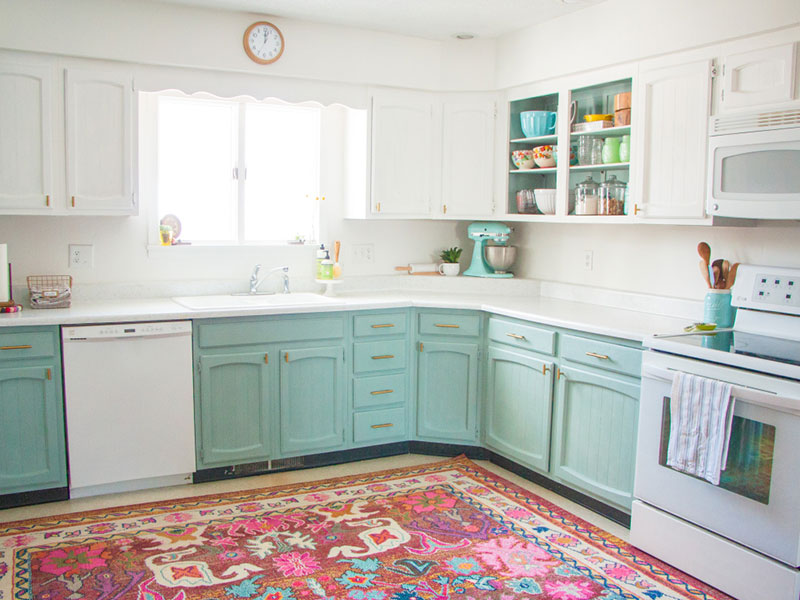 kitchen with light blue lower cabinets