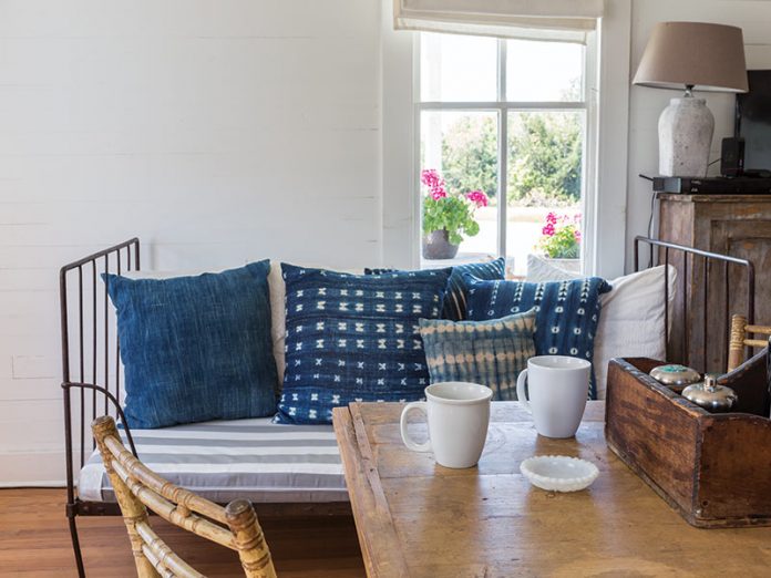 daybed with navy pattered throw pillows
