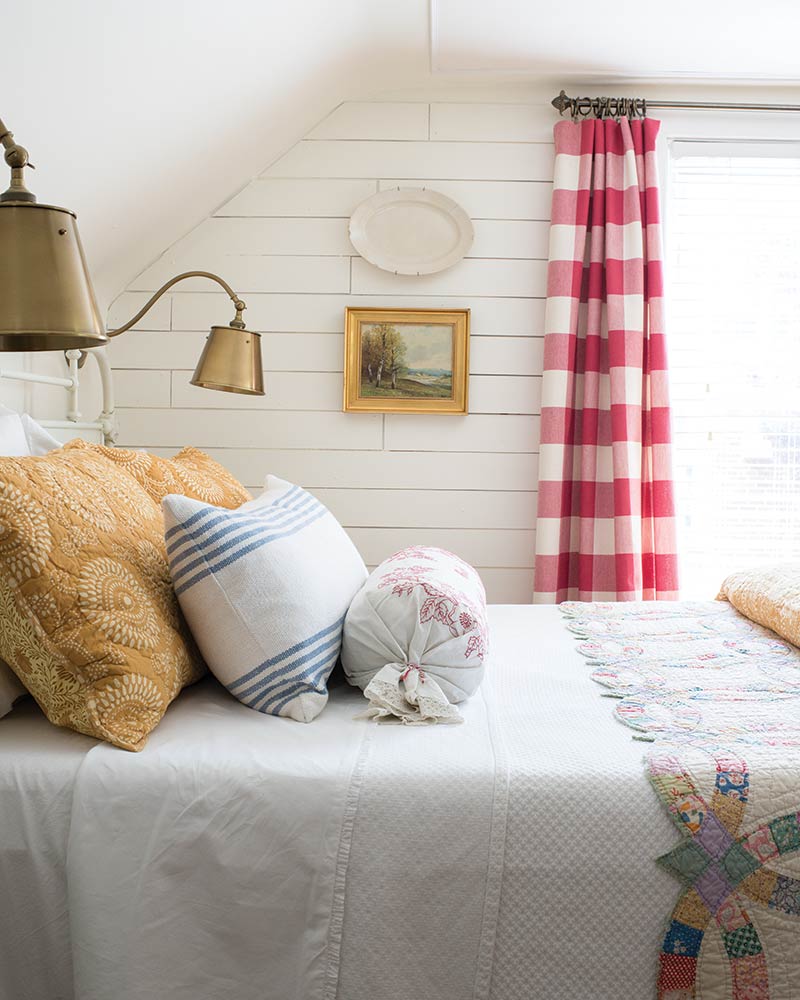 country style bedroom with red gingham curtains
