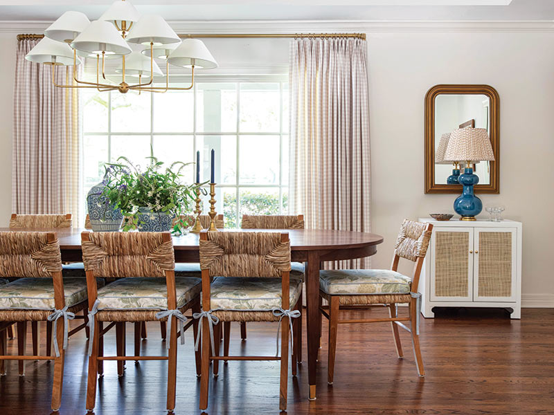 A dining room with woven furnishings. 