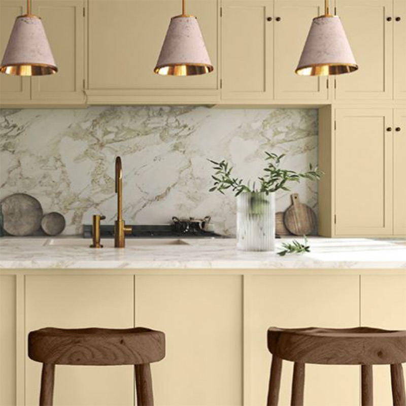 A kitchen with cabinets painted Glidden's Limitless.