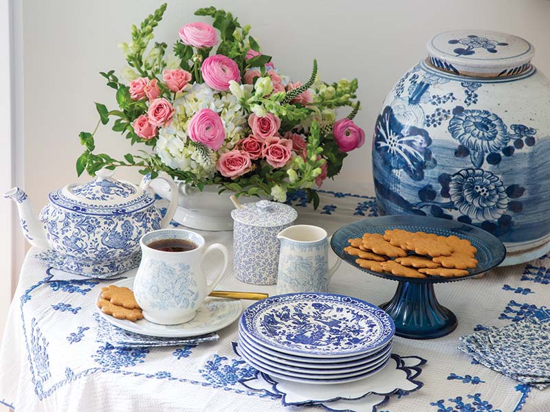 A table set with blue-and-white china. 