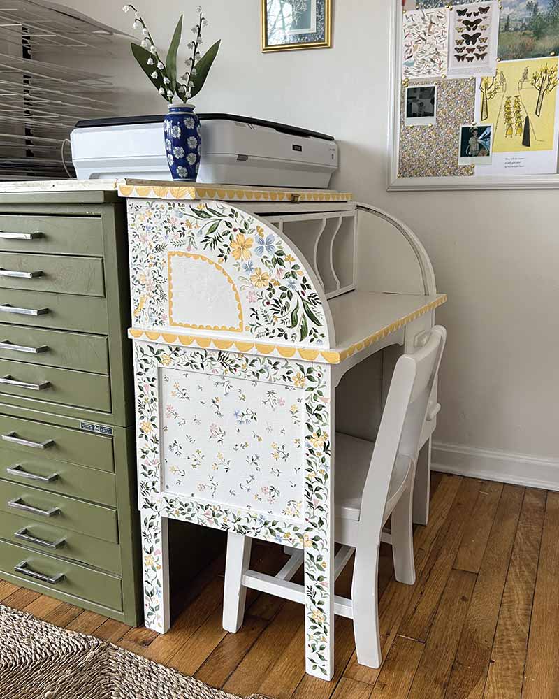 A child's desk painted by Riley Sheehey.