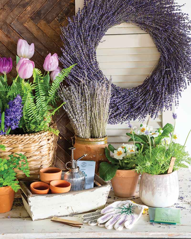 A potting table with garden accessories.