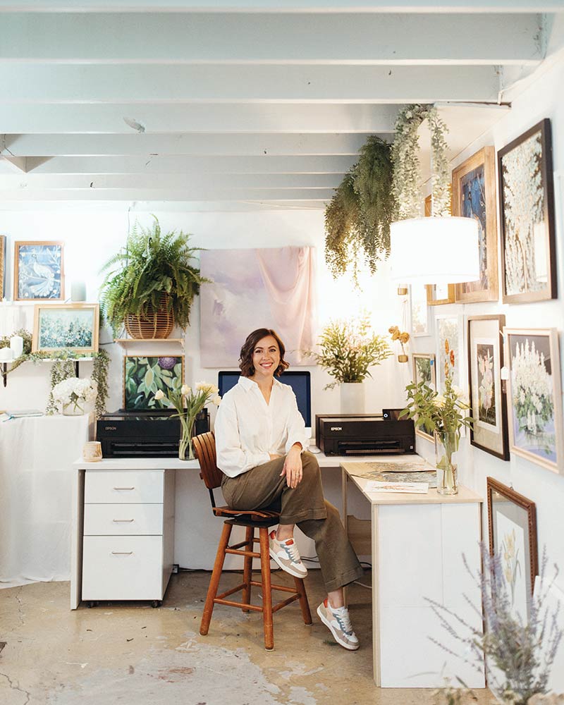 Portrait of artist Meredith Raiford in her art studio.