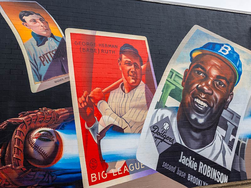 A mural of baseball cards on a wall in Hot Springs, Arkansas.