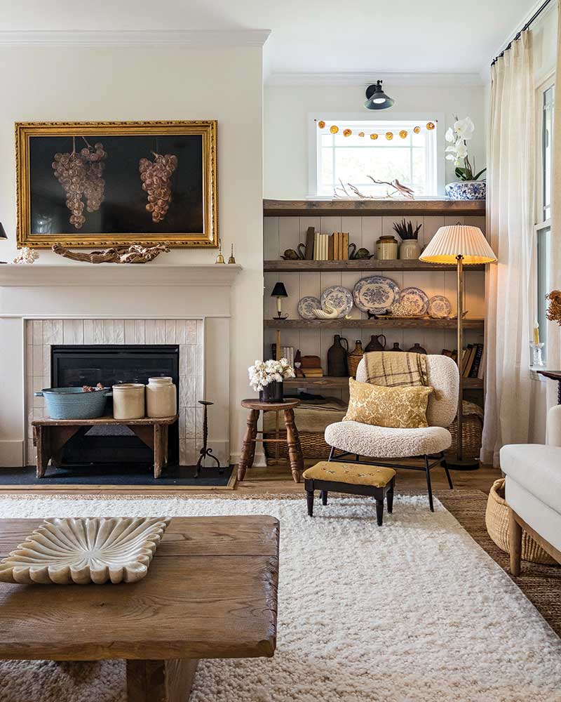 A living room with collected, country style decorated in a warm neutral palette.