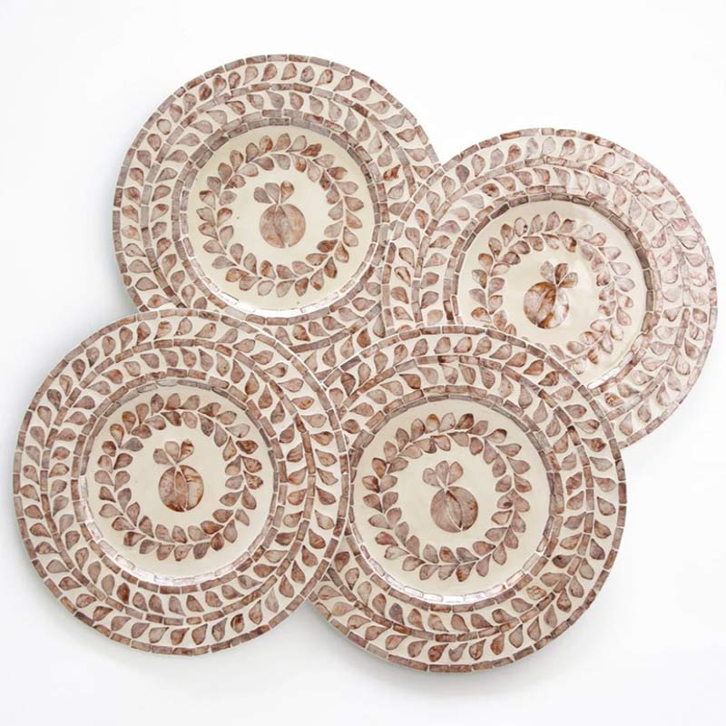 Taupe and white bone-inlay chargers.