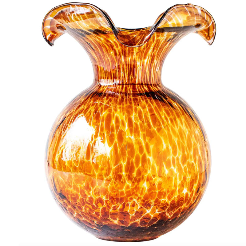 A tortoiseshell fluted vase.