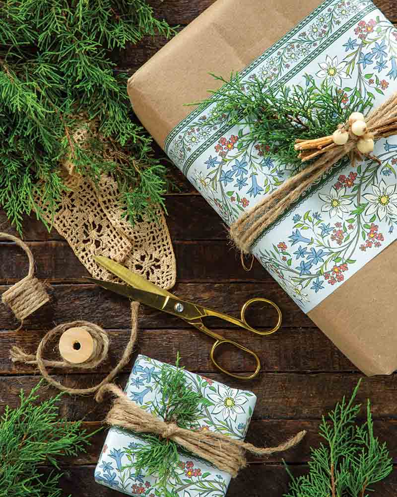 Layer different wrapping papers on one package for depth and contrast.