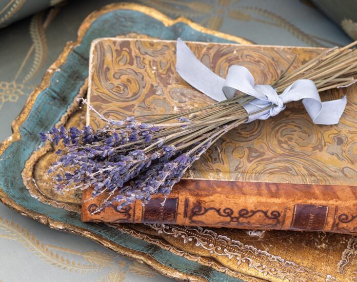 Discover the versatility of antique books and ways to style them around your cottage—both inside and out.