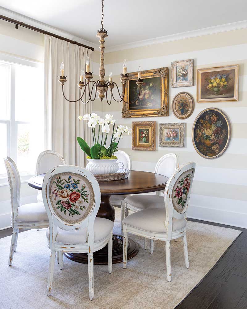 After watching her grandmother work on needlepoint roses for her chair’s cushions as a child, Mary Lee inherited those very chairs, and the stitched designs were later transplanted onto a more practical dining set.