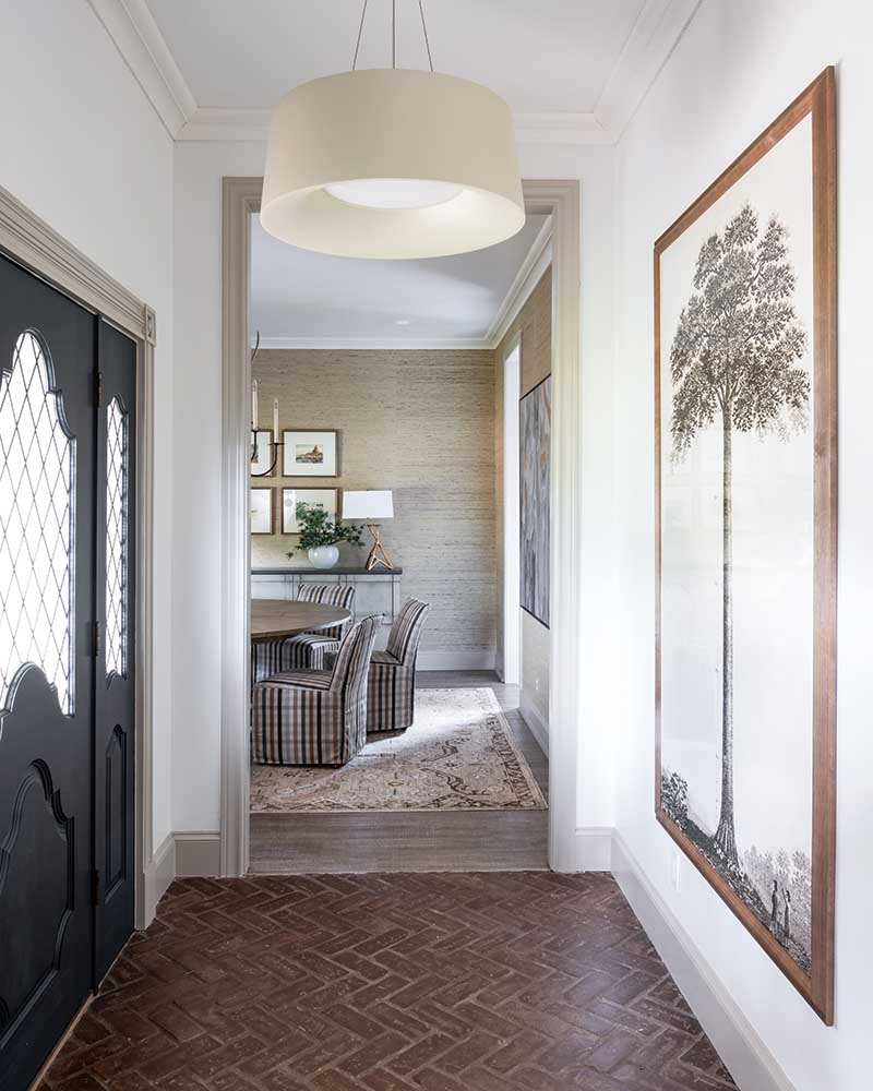 The house featured original elements that merited preservation, like herringbone brick floors.