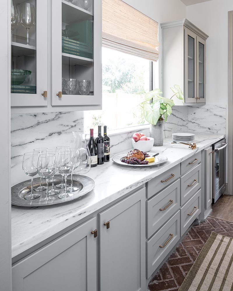 New cabinetry and marble countertops brought the kitchen up to date.