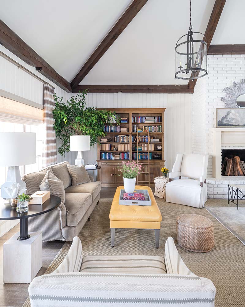 Within the open living space, they arranged separate seating areas furnished with new pieces selected for both style and comfort.