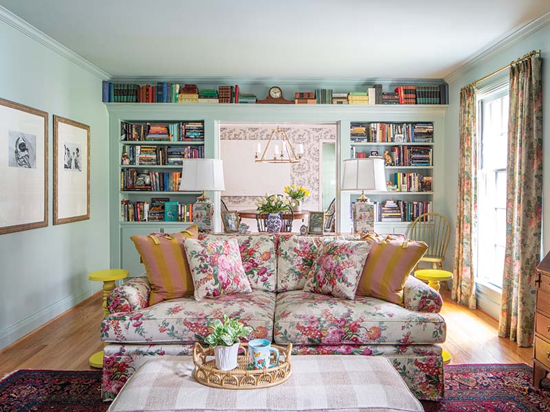 While the built-ins were original to the home, Casey added the top shelf that spans the length of the wall and houses her books on either side of a clock made by the former owner, Paul Hopkins, who was a horologist.