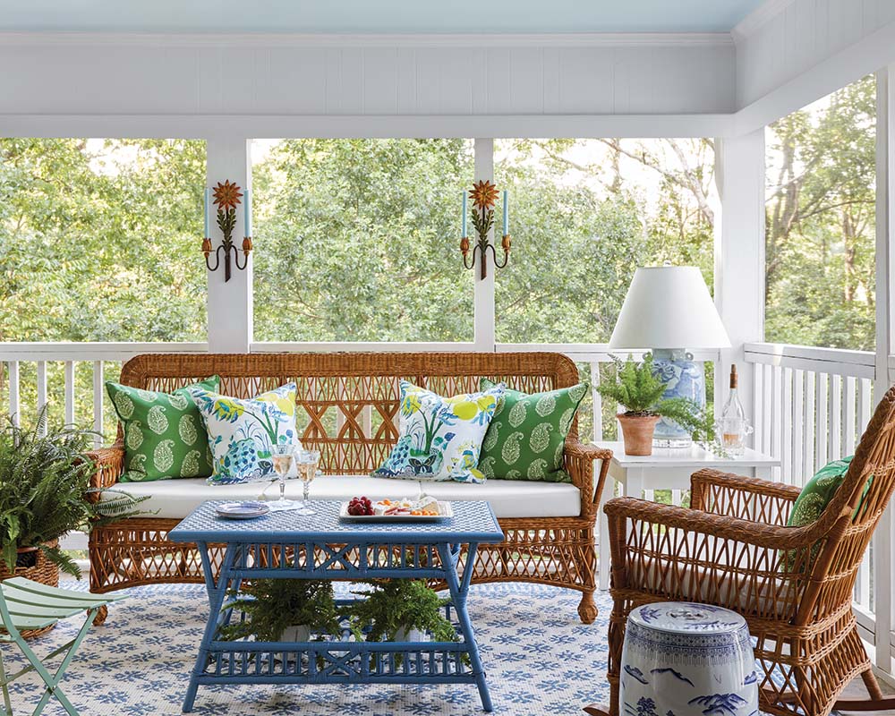 Whether they’re sipping coffee in the morning or enjoying an evening cocktail, homeowners Bailey and William Ward consider the screened porch a favorite spot.