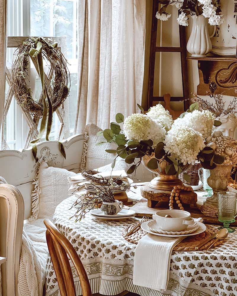 The dining room lies just across the living space and showcases Jamie’s talent for carpentry.