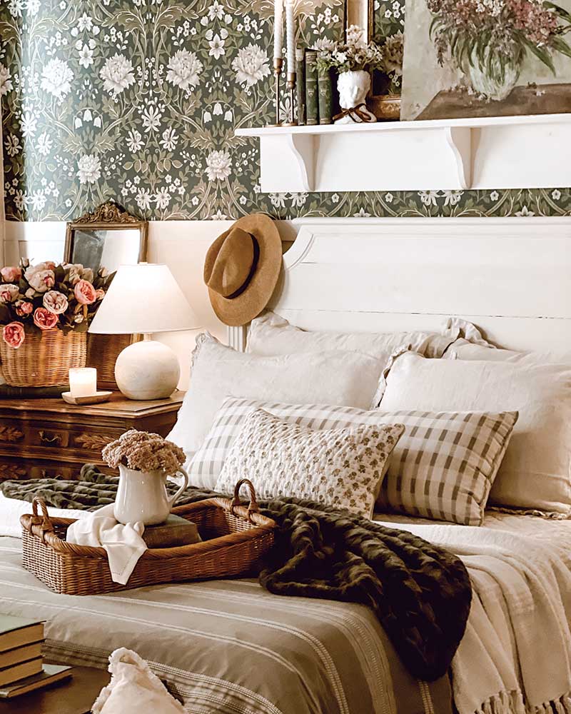 Upstairs, the primary bedroom deviates from the layers that fill the rest of the home.