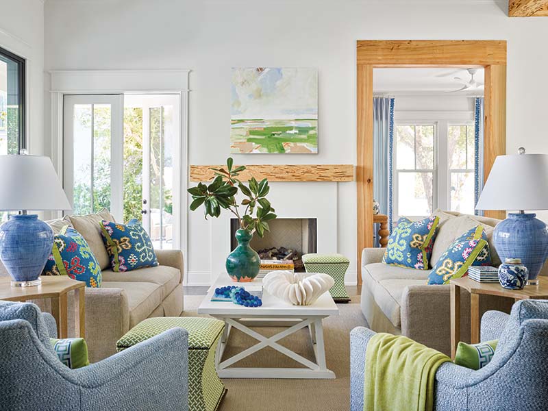 Liz took the familiar blues and greens of a beach setting and cranked up the saturation, pairing the bold hues with plenty of white surfaces and making sure to, as she notes, “make each space a little bit different but keep the flow of the house going.”