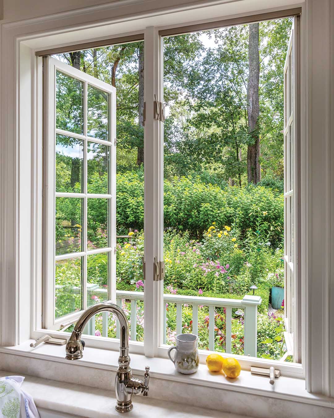 Inspired by renowned designer Ellen Biddle Shipman’s plan for the grounds of a 1929 estate that now serves as Wake Forest University’s presidential residence, the garden is showcased from every window in the Hearn home. “Laura wanted to be able to look out into an ordered space between the garden shed and her kitchen window,” says Chip.