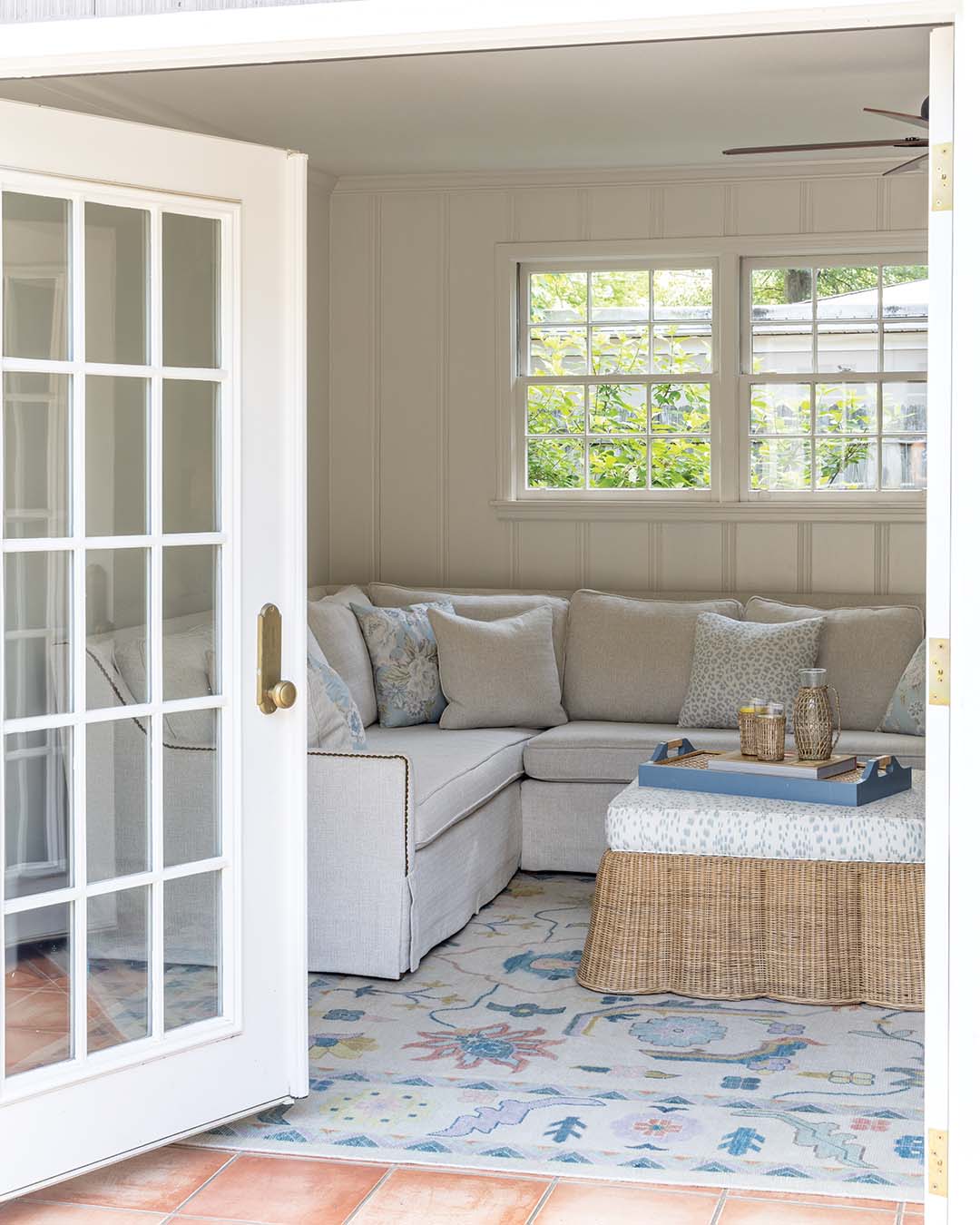 When the French doors are opened, the space spills out onto the patio at the back of the house, fulfilling a desire the couple had for the design.