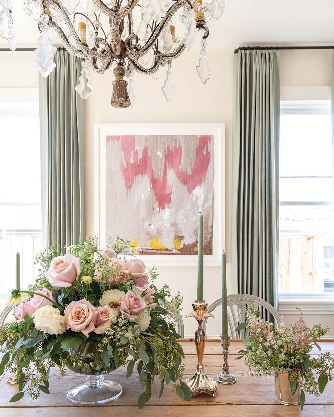 A piece by Helen Frankenthaler found pride of place in the dining room after hanging on an out-of-the-way wall in the home, its vibrant colors perfectly showcased by the dining room’s peach-toned walls. “This seemed like a really happy place for it,” Minnette says.