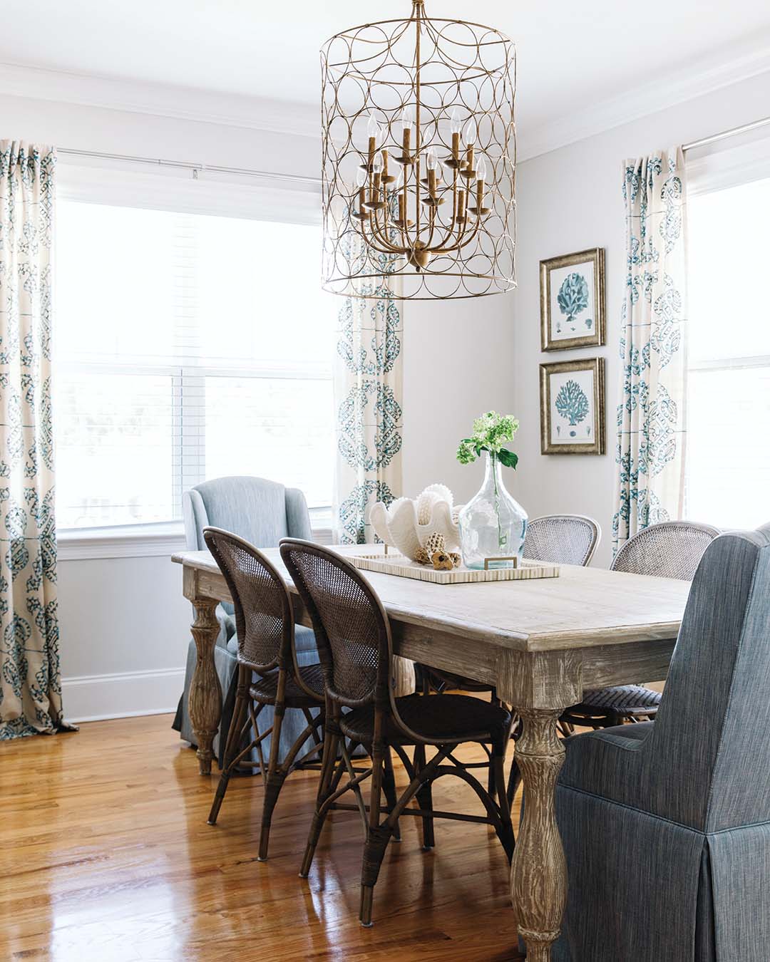 In the dining room, supplementing the distressed finish of the table, the mixed seating is both functional and fun.