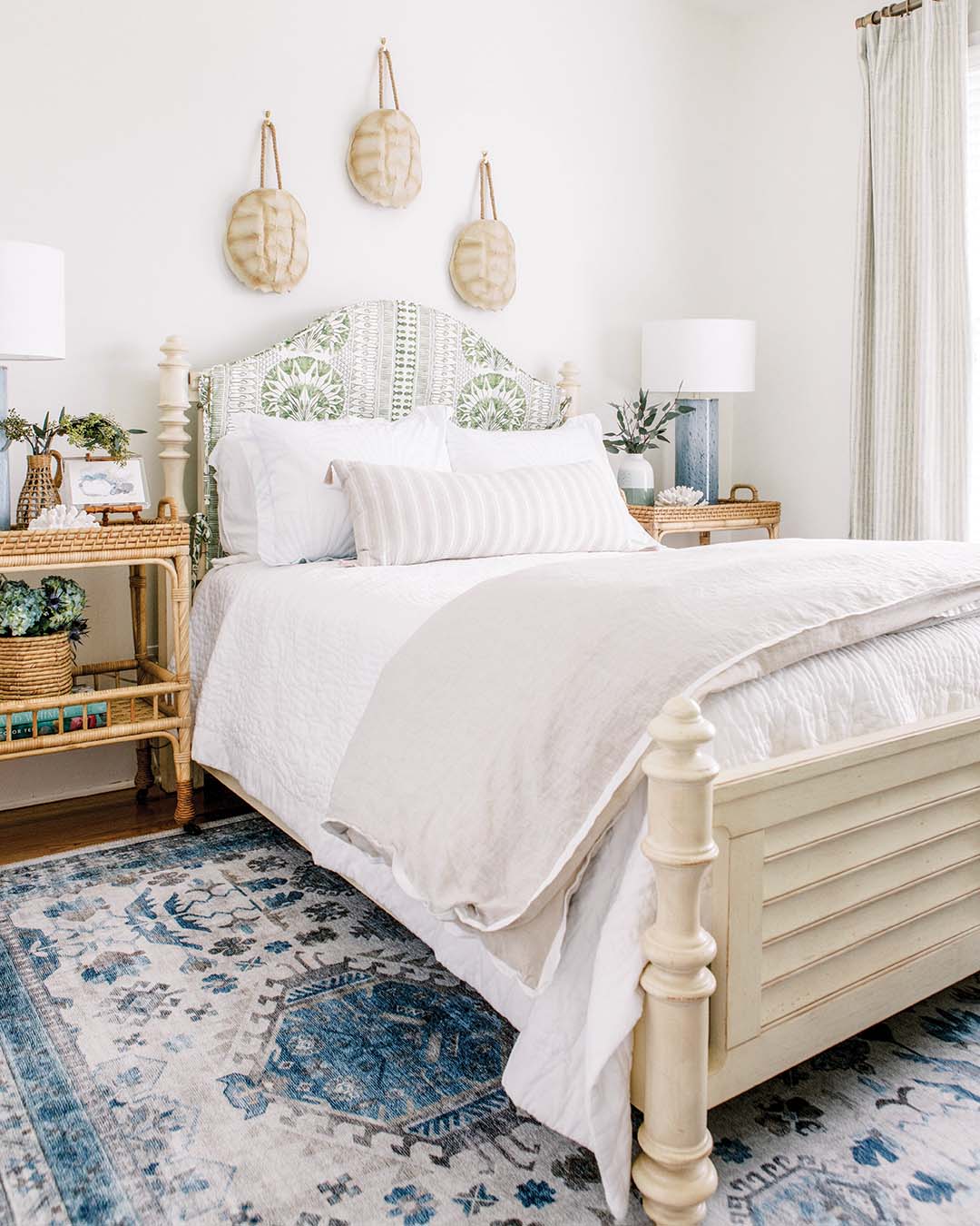 In the guest bedroom, Jessica hung a trio of large turtle shells, creating an unexpected focal point.