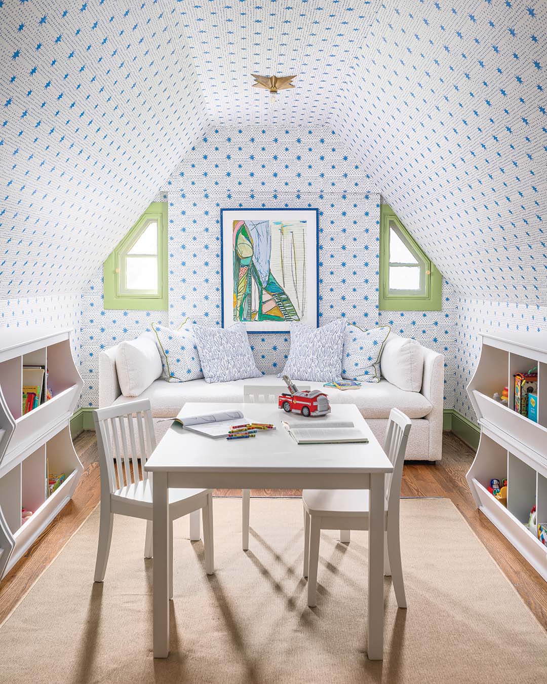 From a table for art projects to comfy spots for curling up with a book, this cheery and whimsical room is a kid’s paradise.