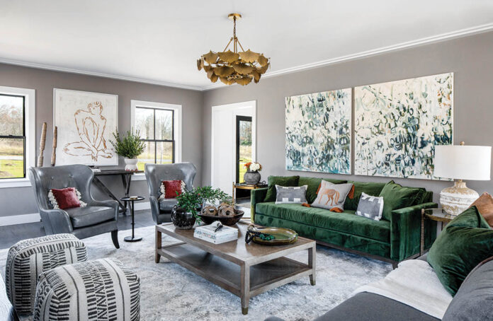 urther demonstrating that approach, the green sofa in the living room was, as Karen notes, a bold move for the homeowners—but it was one that paid off.