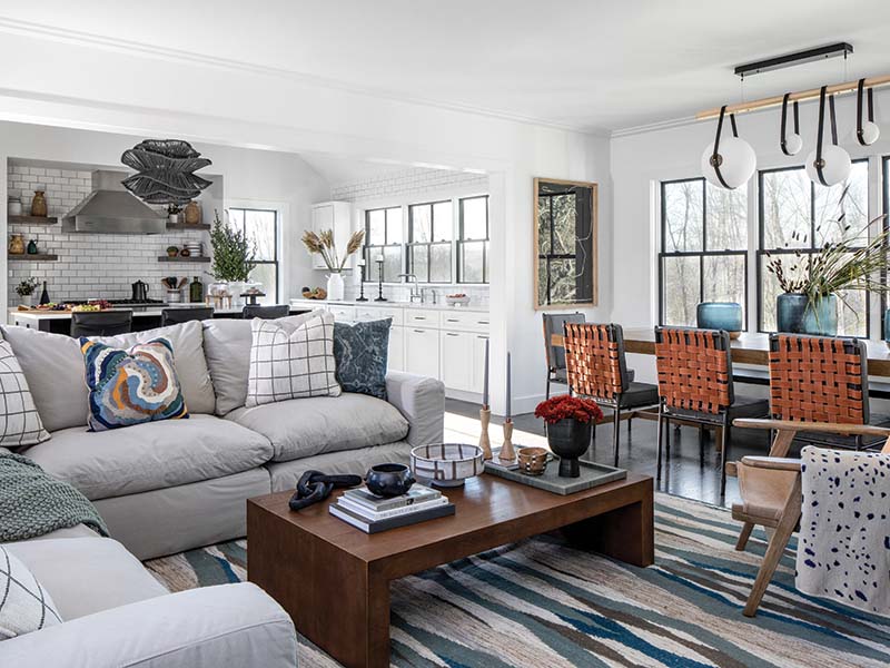 The inspiration for the color scheme, a hand-knotted kilim rug in the family room, kicked off a design that showcases handmade, craftsman-style pieces.