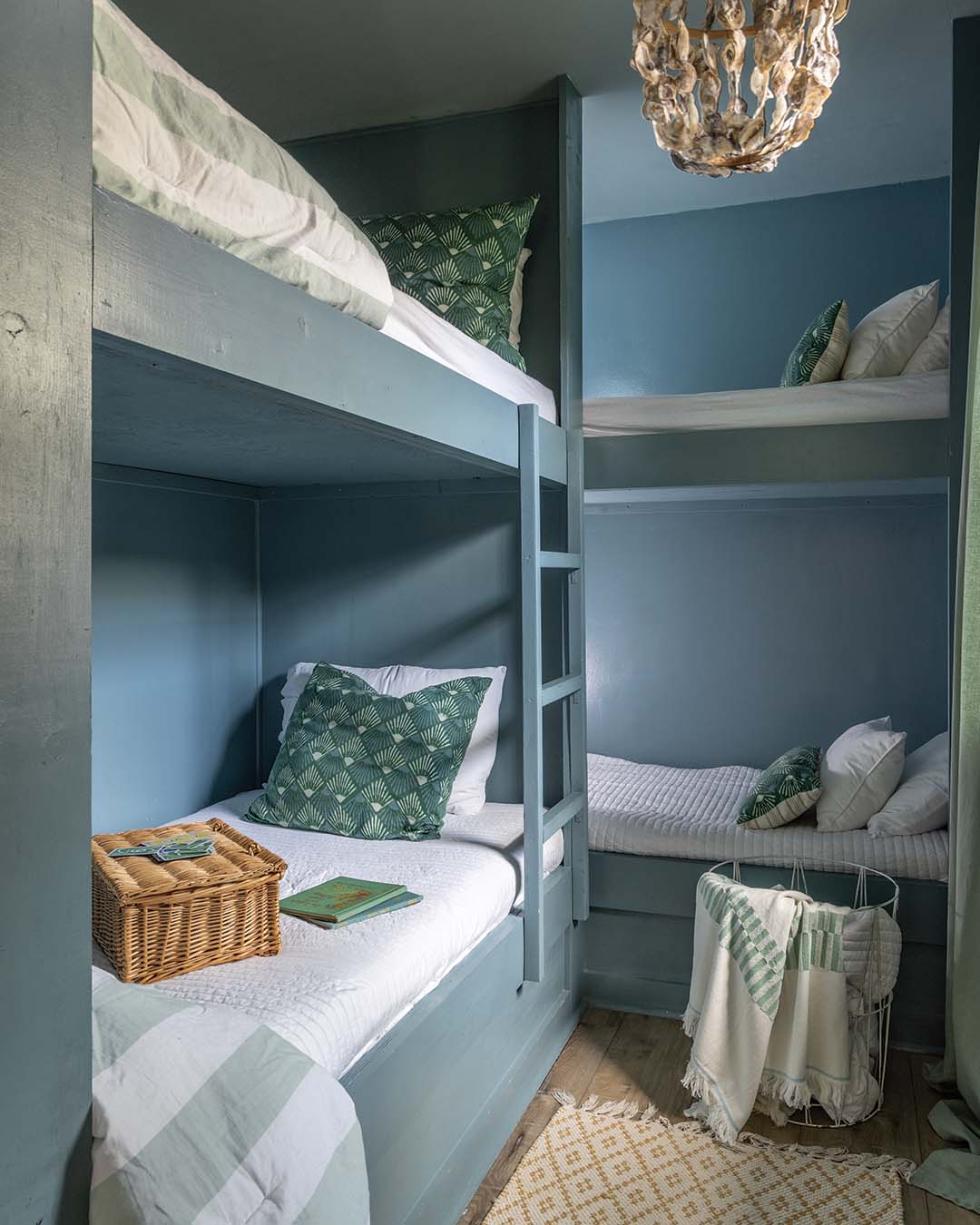 As the property was previously a one-bedroom cottage, Suzanne and her husband split what was a large primary bedroom into two separate sleeping quarters, creating a bunkroom for their four children.