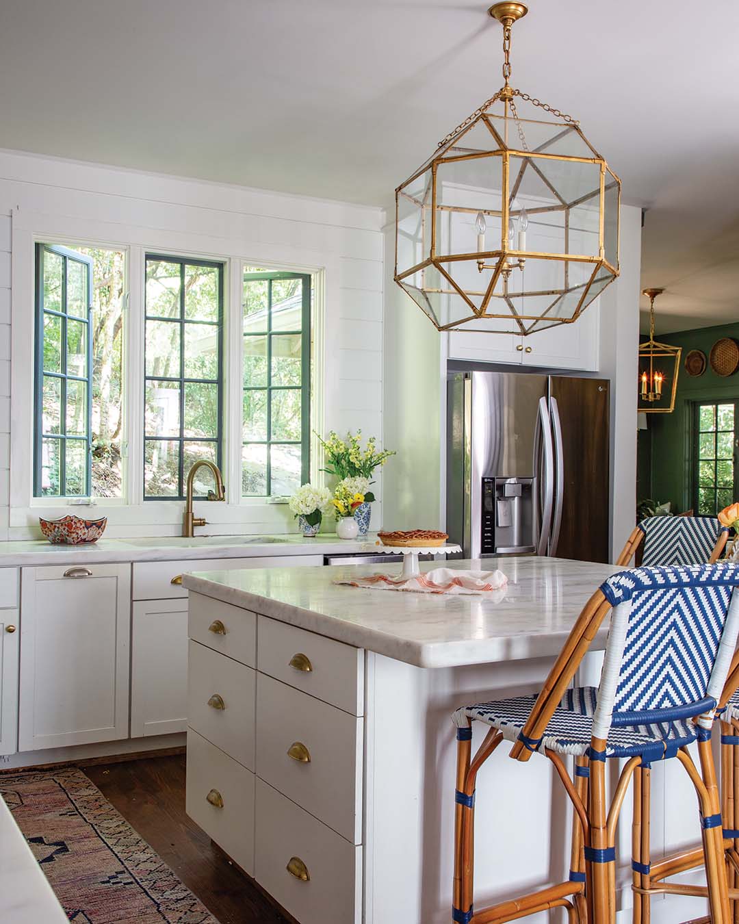 One of the most alluring aspects of the home, the view outside the windows lends the interiors added tranquility, and Suzanne was careful to highlight that element rather than creating a design that would distract from it.