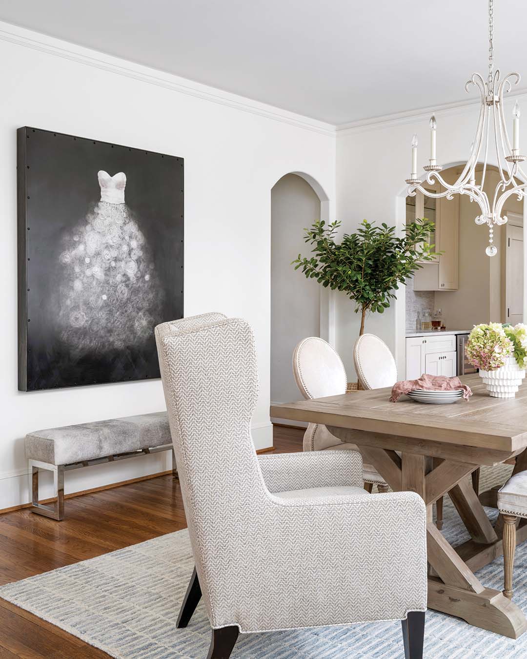 A multimedia work by Craig Alan depicting a white dress caught the eye of both Natalie and her husband, Steve. “I go for my gut feeling, and I like what I like,” Natalie says of her opinion on purchasing art. “Our approach is—don’t take it so seriously and just have fun with it.”