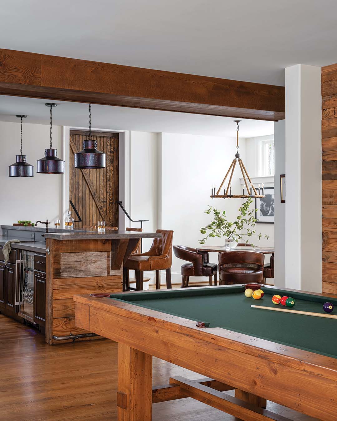 The game room in the basement is geared toward gathering.