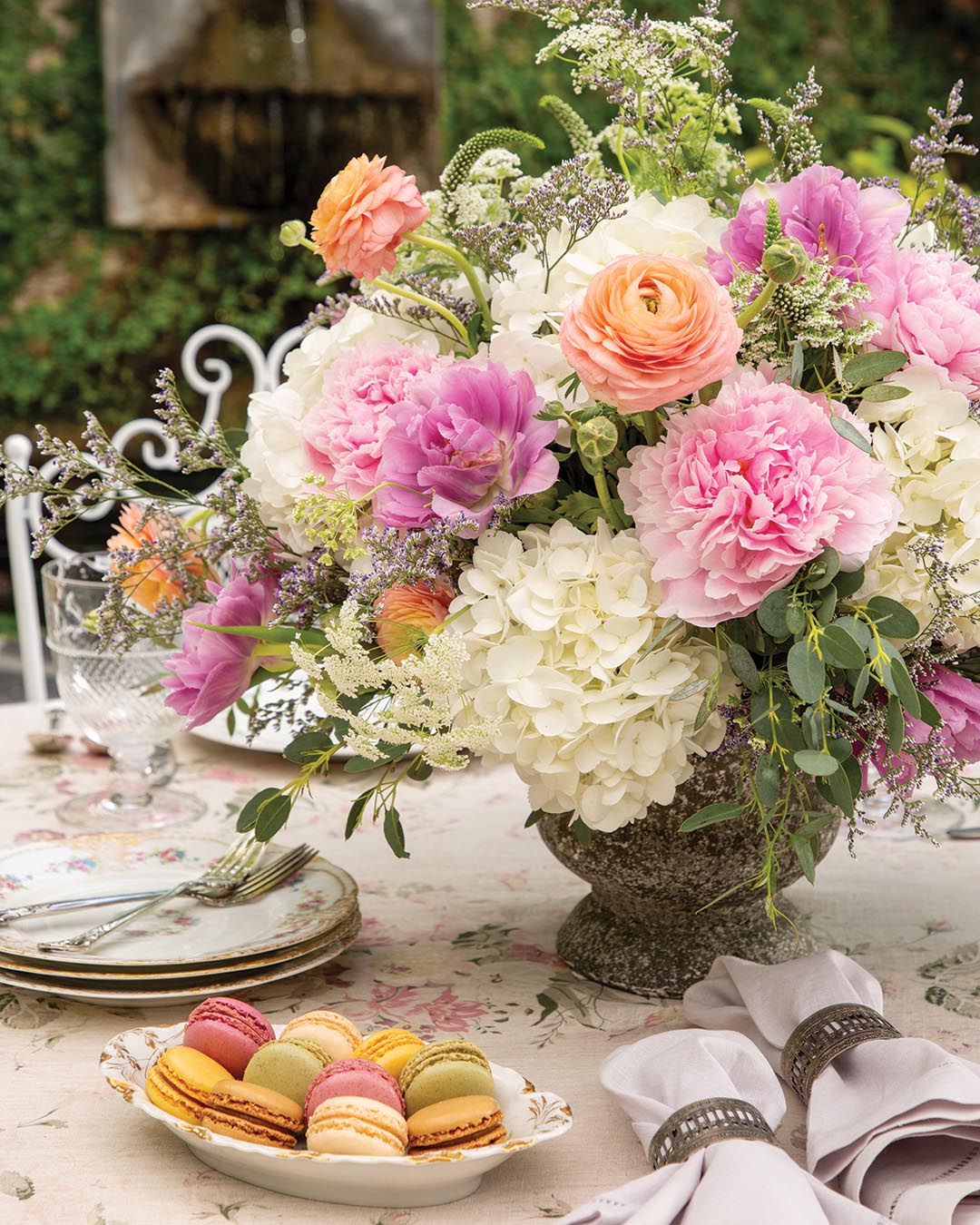 A vibrant array of macarons adds the perfect final touch to the display.