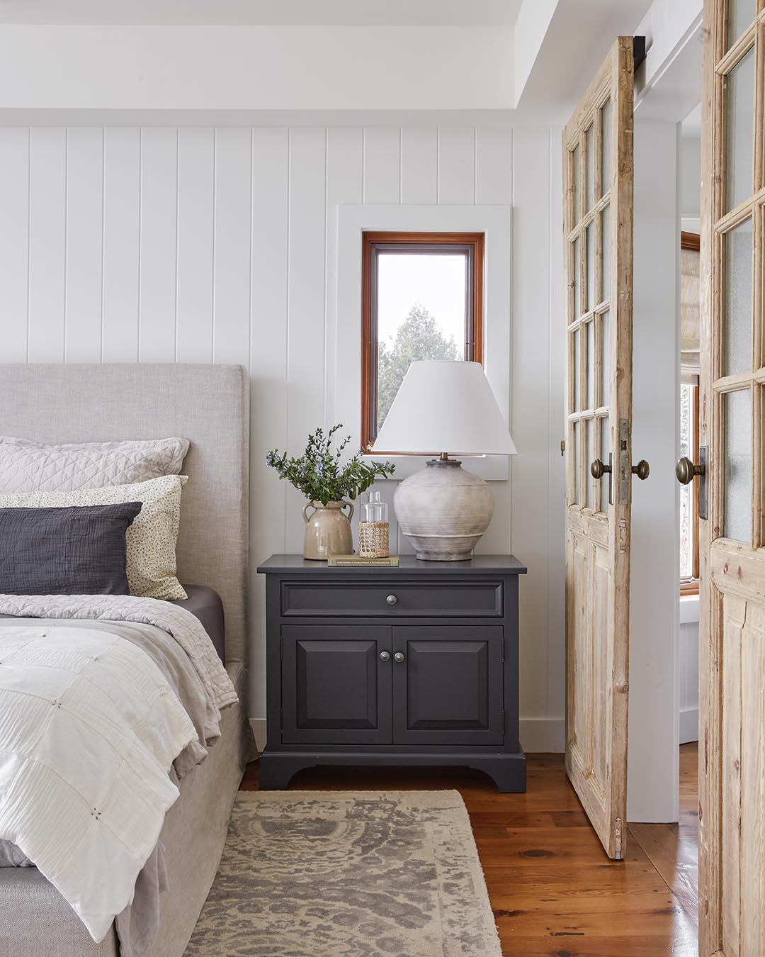 With rich hues and aged accents, this Canadian retreat shines with warmth and rustic charm.