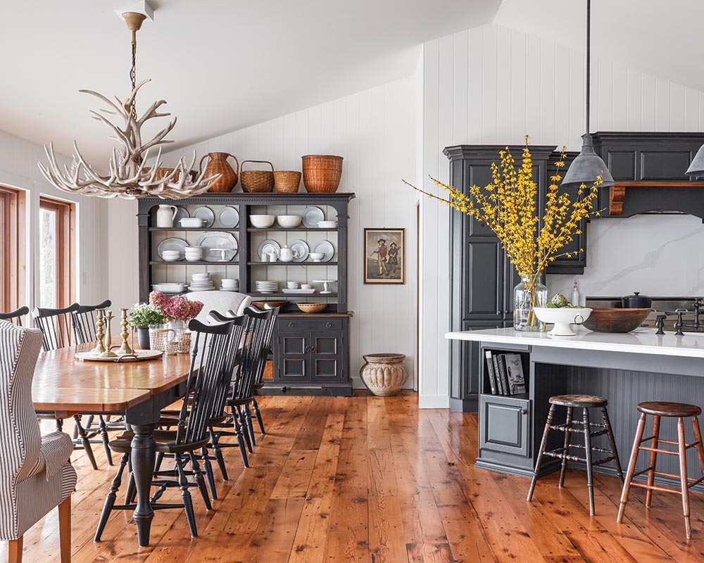 “With the kitchen configuration the way it was, we painted all the cabinets out and put on new countertops and backsplash to give it a fresh look without actually doing a major renovation to that space,” designer Ashley Montgomery says.