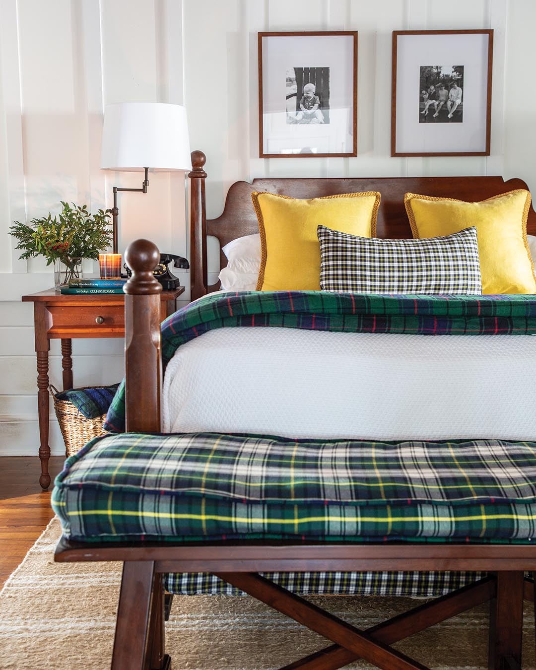 The primary bedroom is a casual space that encourages relaxation. “The bed was originally a formal four-poster bed that was my wedding gift from my husband,” Kelly says. “When we decided to move here, I knew that bed was too formal, but I couldn’t part with it. So, I had my husband cut the posts shorter and add ball finials—now it has the more casual feel of an old cannonball bed.”