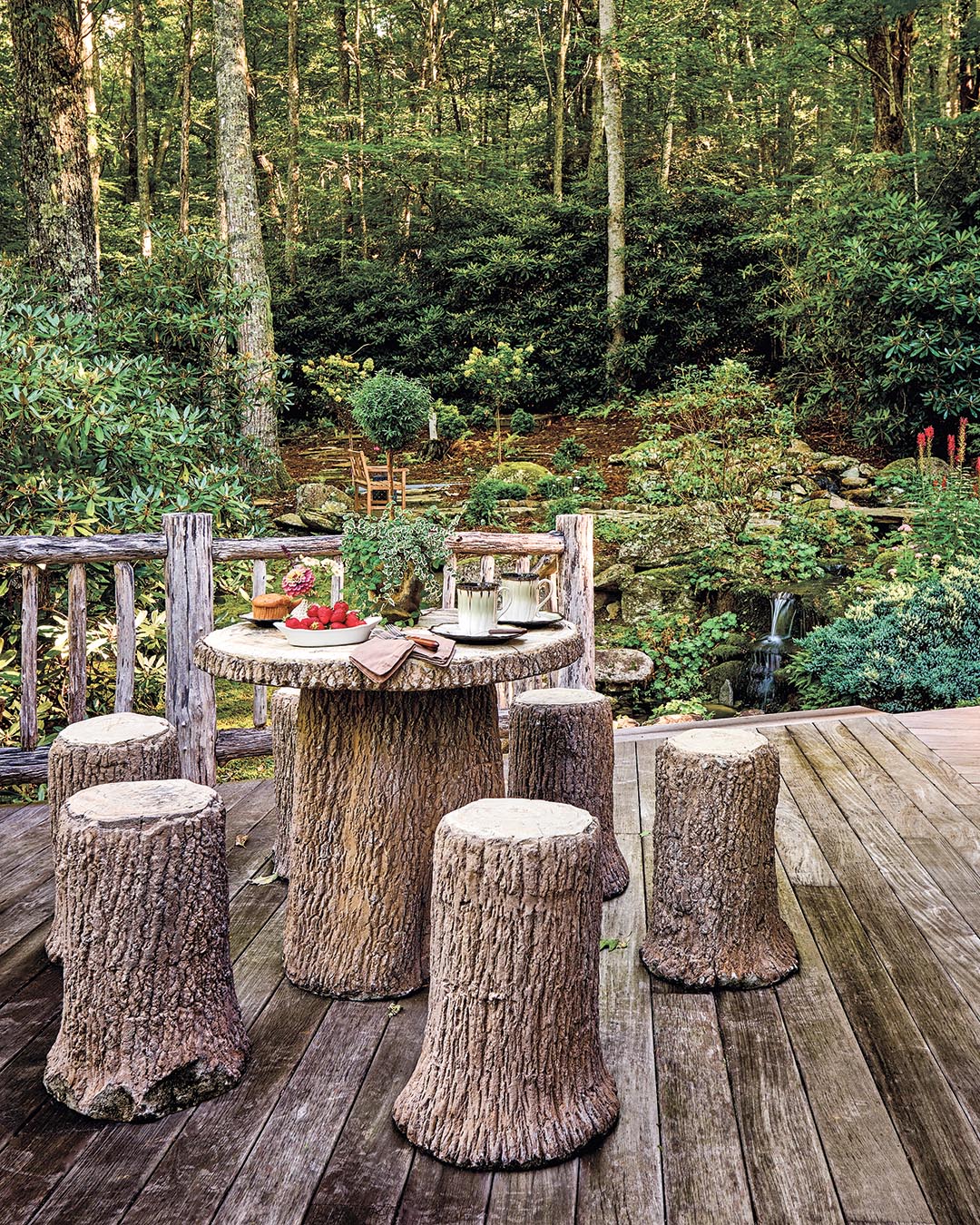 The vintage faux-bois set Debbie found was the perfect touch for the deck. “It’s a great little spot for late afternoon or early evening to sit outside with a glass of wine and listen to the waterfall feature,” she says. “We’re so secluded from anybody else, it’s just wonderful—it’s so quiet.”