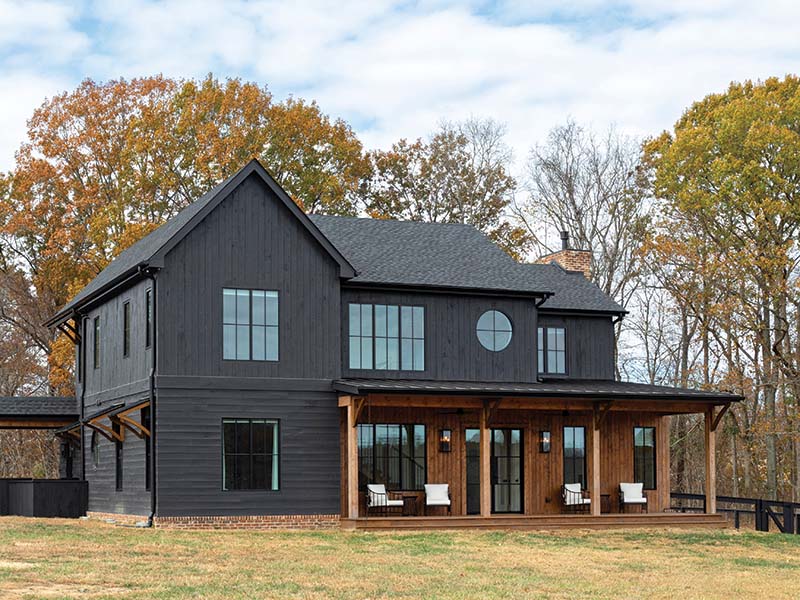 “The initial concept was a modern take on the traditional farmhouse—mixing a Japanese or mid-century modern transparency and connection with nature with a traditional farmhouse,” says architect Megan Glenn.