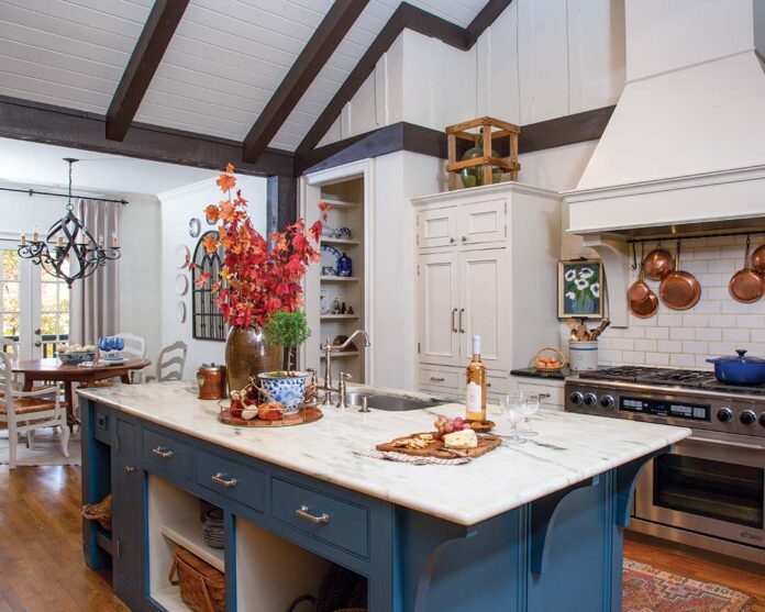 Vaulted ceilings make a reappearance in the kitchen, where an asymmetrical design lends unique character and quirkiness that Janet fully embraces.